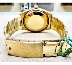 Rolex Oyster Perpetual Date 14kt Yellow Gold Stardust Black Dial Full Set 15037